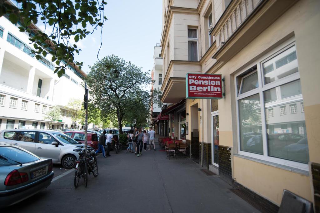 a street with a sign that reads pedestrian realm at City Guesthouse Pension Berlin in Berlin