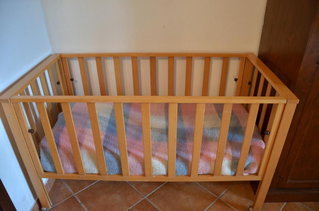 A bed or beds in a room at Agriturismo Il Casalone
