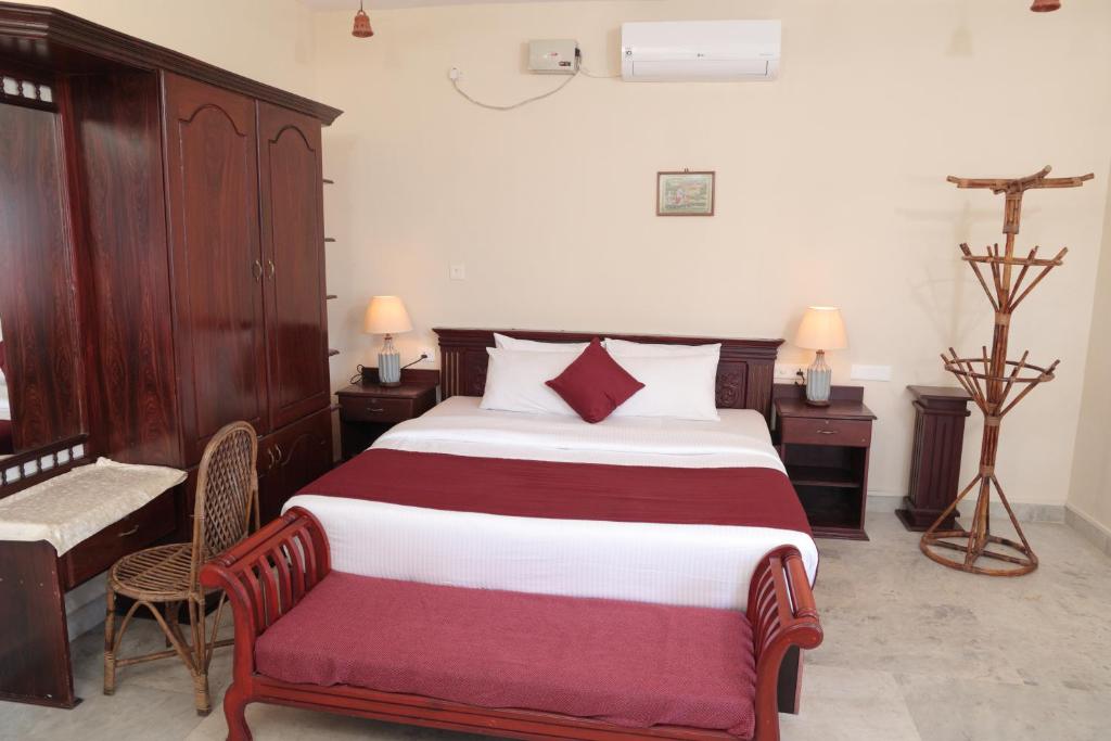 Rúm í herbergi á Hillview Beach Resort
