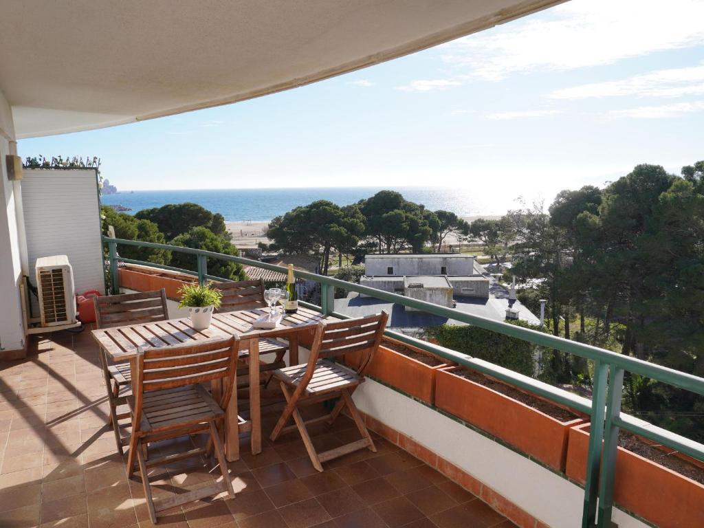 a patio with a table and chairs on a balcony at Medas Park 261 - L'Estartit, Centro - ES-323-89 in Torroella de Montgrí