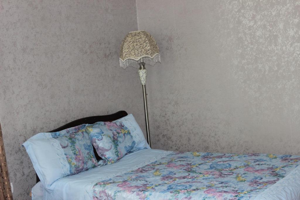 Postel nebo postele na pokoji v ubytování Villa Gabliani