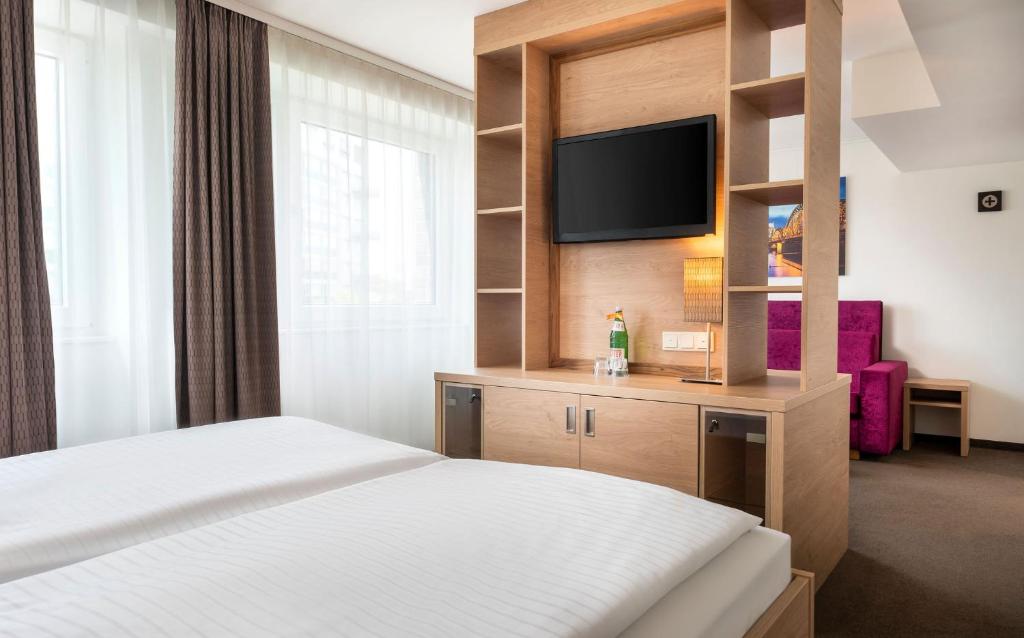 Stadthotel am Römerturm - Resim 19