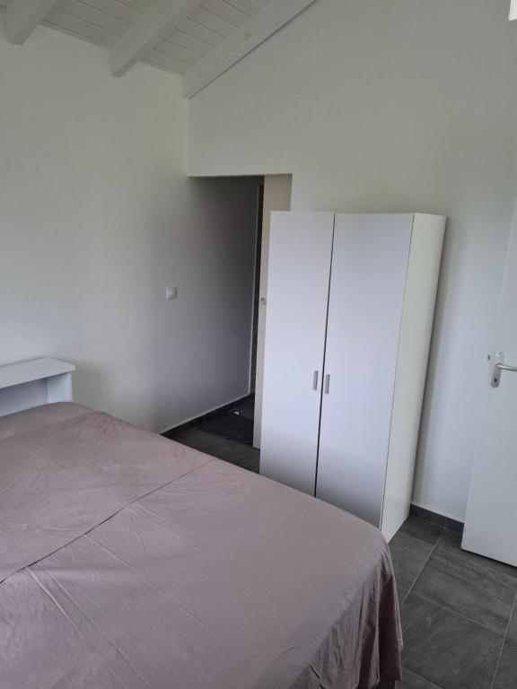 Ένα ή περισσότερα κρεβάτια σε δωμάτιο στο Bungalow AN KAN LA