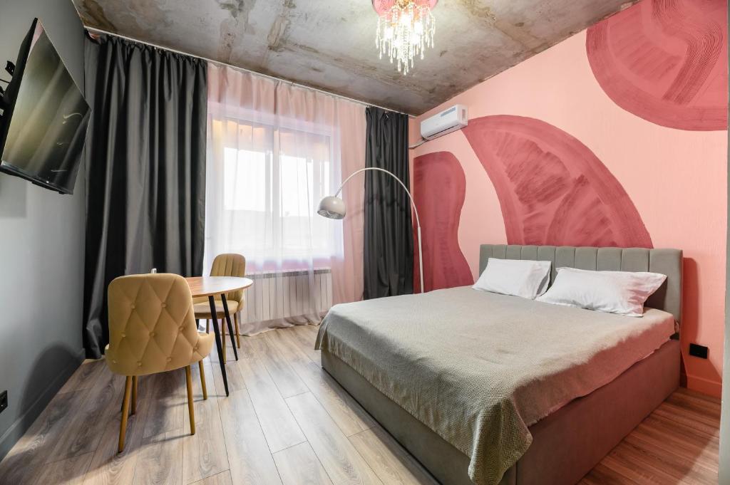 Ένα ή περισσότερα κρεβάτια σε δωμάτιο στο Уютная около Арбата, ЖК Меридиан