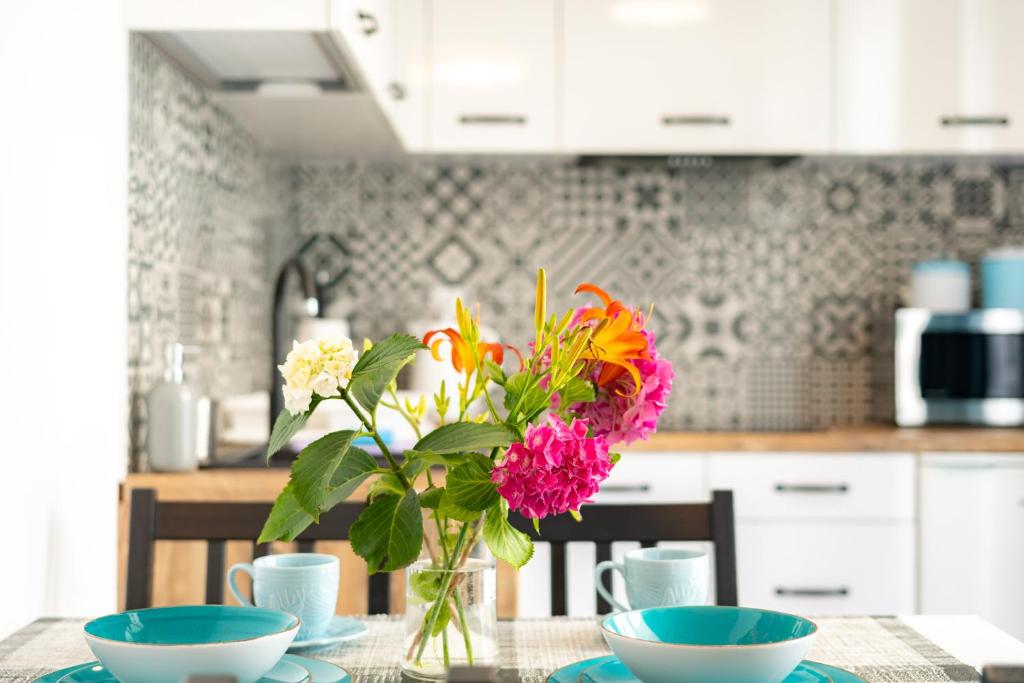 Kuchyň nebo kuchyňský kout v ubytování APARTAMENT NADMORSKI