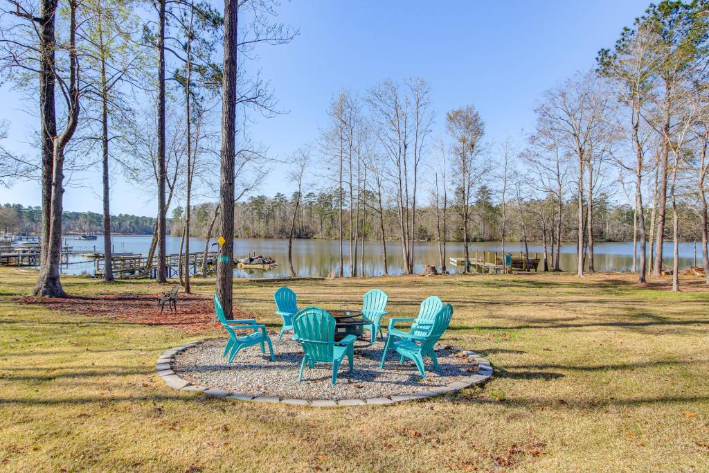a group of chairs sitting around a table in a park at Private Dock, Fire Pit Lake Murray Family Escape! in Lake Murray Shores