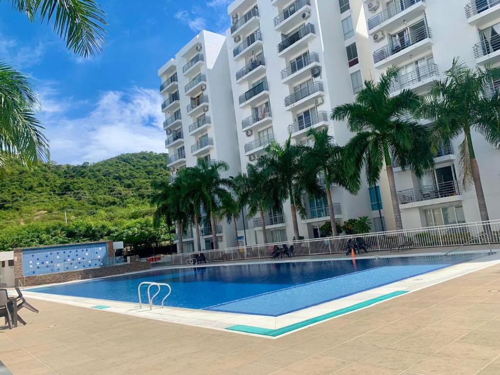 Πισίνα στο ή κοντά στο SIENTETE COMO EN CASA, APTO LINDO,FRESCO,Amoblado,2 Alcobas, Parqueadero, Conjunto Via NARIÑO GIRARDOT, CONJUNTO AQUALINA GRREN