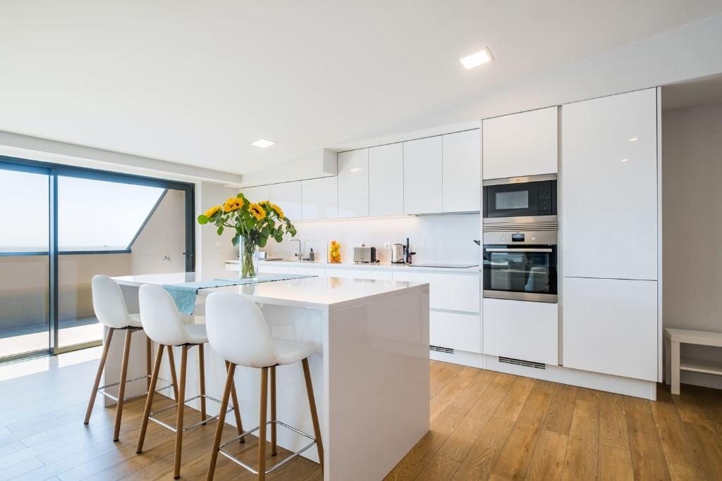 Kuchyň nebo kuchyňský kout v ubytování The Shoreline 5 by Portugal Portfolio