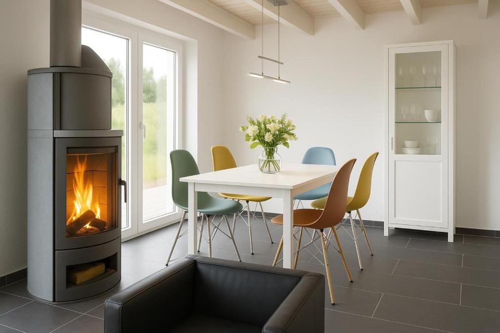 Posezení v ubytování Dock 61 - tolles Ferienhaus für bis zu 4 Personen mit Kaminofen und Sauna - Haustiere herzlich willkommen, direkt am Wasser gelegen