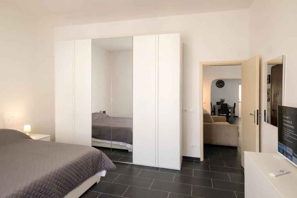 Ένα ή περισσότερα κρεβάτια σε δωμάτιο στο Casa Laura mare