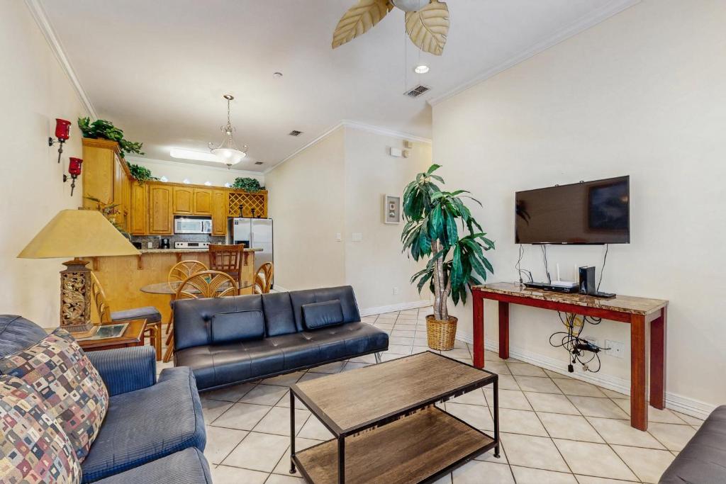 a living room with a couch and a table at Escape Condominiums #2 in South Padre Island