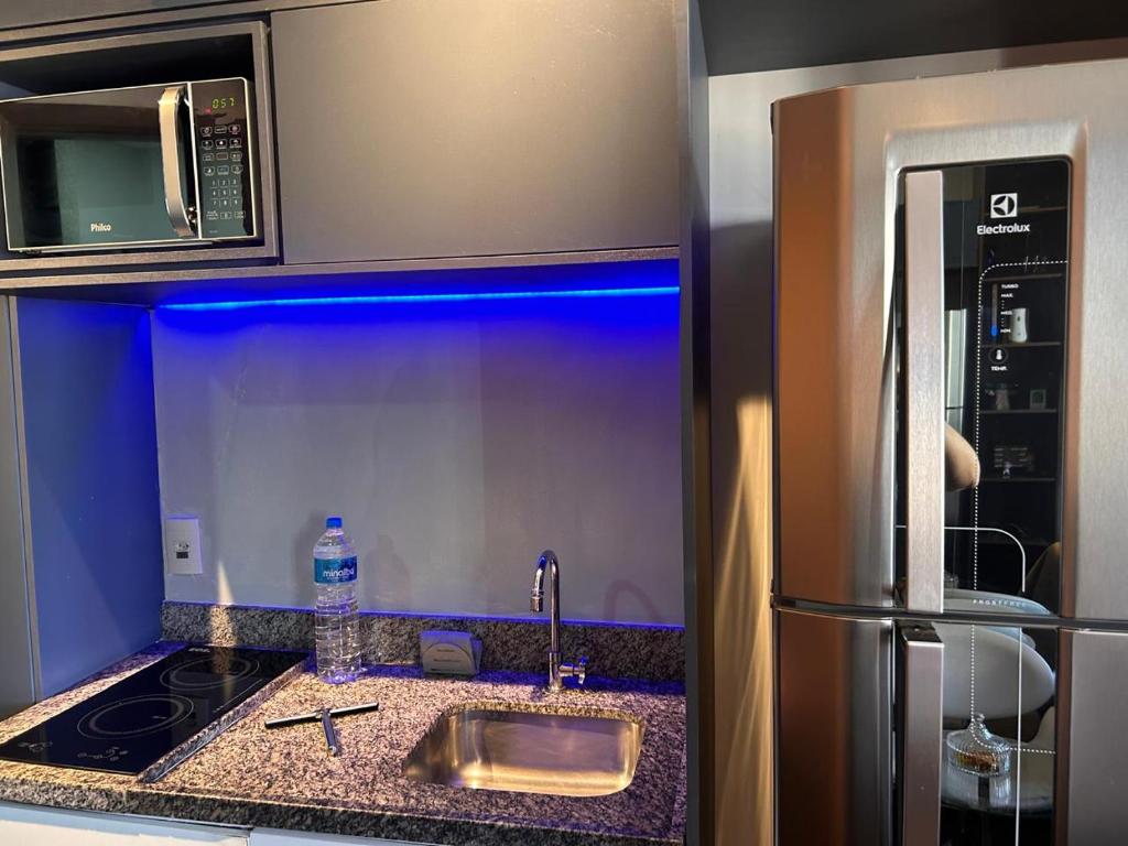 Kuchyň nebo kuchyňský kout v ubytování Studio Neo Home São Caetano, aconchegante e compacto