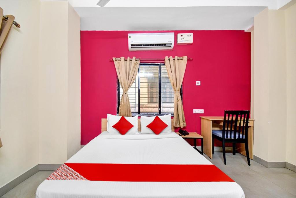 Katil atau katil-katil dalam bilik di Hotel O Grand Lazeez Dumurjala outdoor Stadium