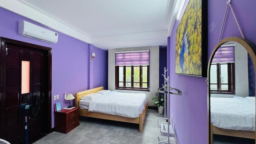 Postel nebo postele na pokoji v ubytování Hue Color Homestay