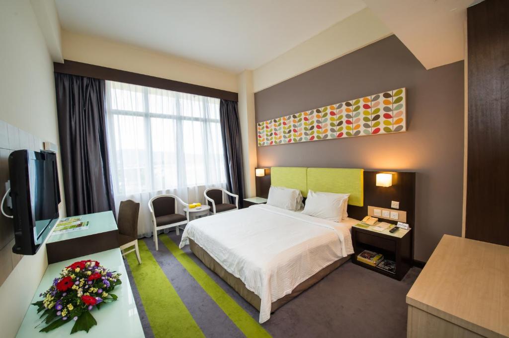 Postel nebo postele na pokoji v ubytování Mega View Hotel