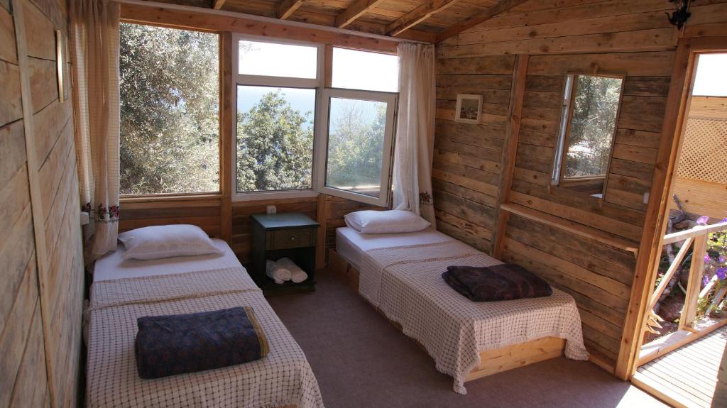 Postel nebo postele na pokoji v ubytování Shiva Camp