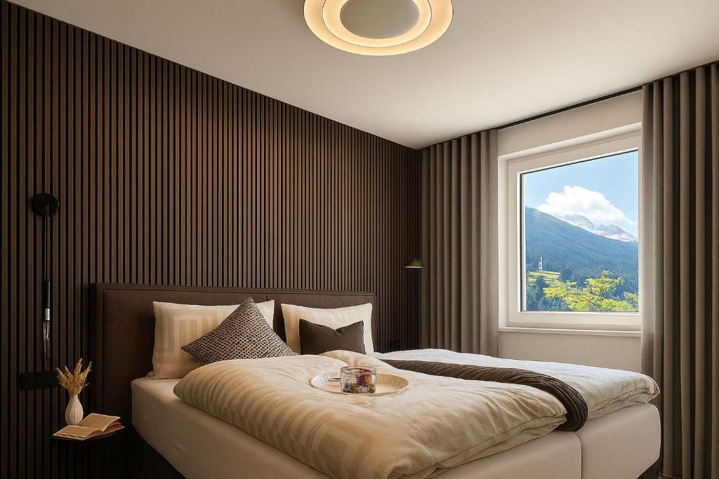 Postel nebo postele na pokoji v ubytování Lynett Suites