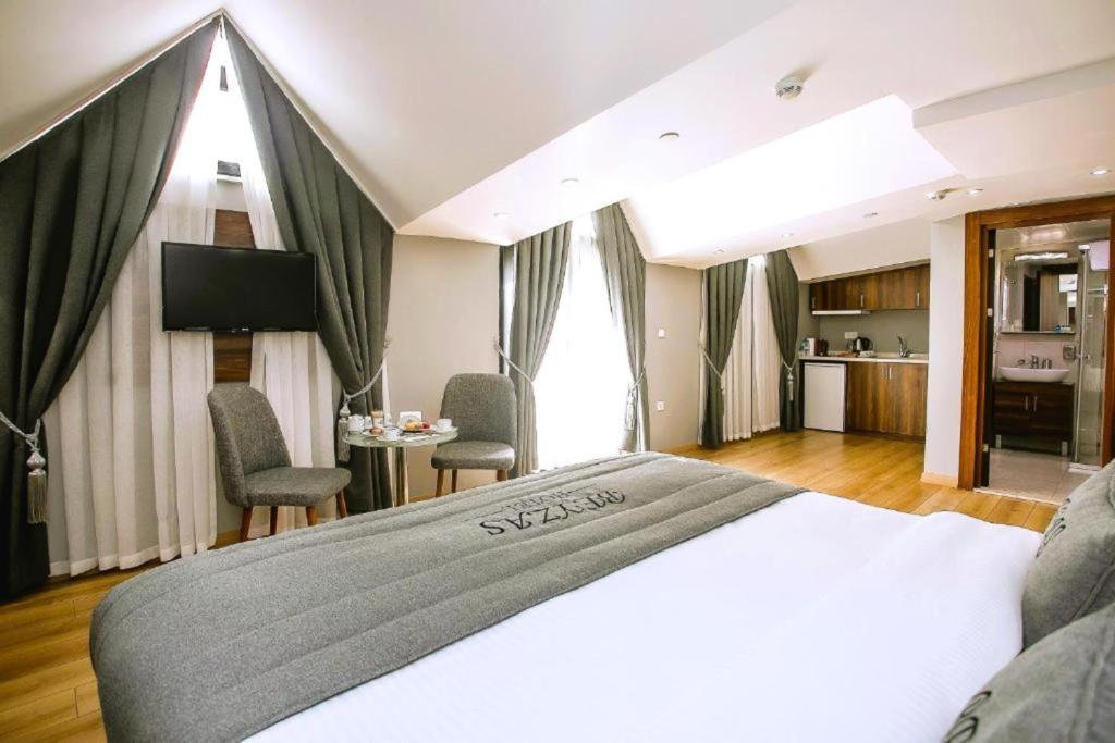 تصویر اتاق‌های Beyzas Hotels & Suites - تصویر ۲