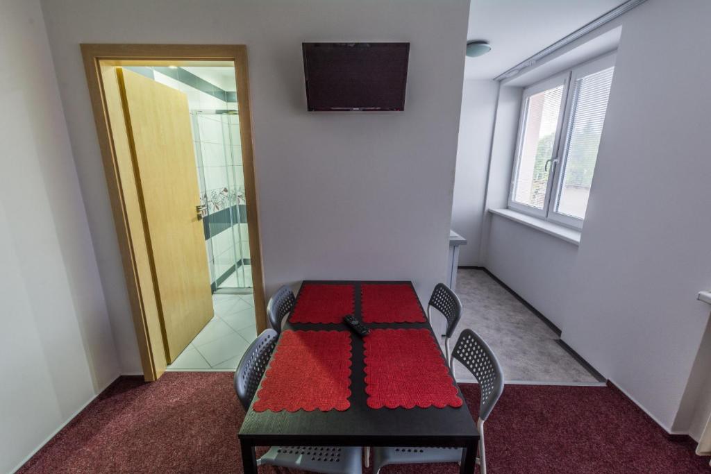 Telewizja i/lub zestaw kina domowego w obiekcie Apartmány Vilma