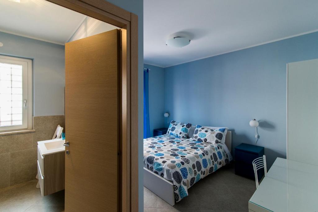 Postel nebo postele na pokoji v ubytování Guest House Roma Express