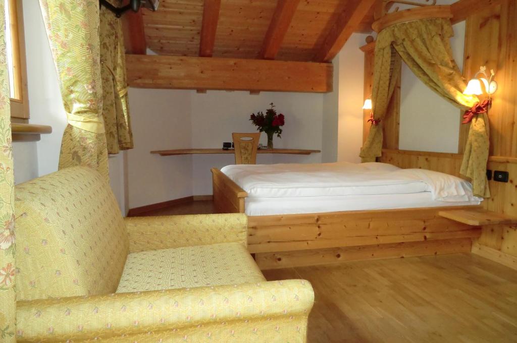 Postel nebo postele na pokoji v ubytování Garnì Costa Verde