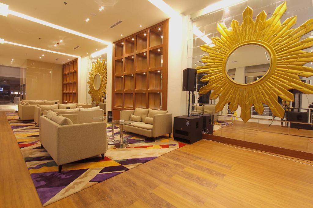 Posezení v ubytování Royal Asnof Hotel Pekanbaru