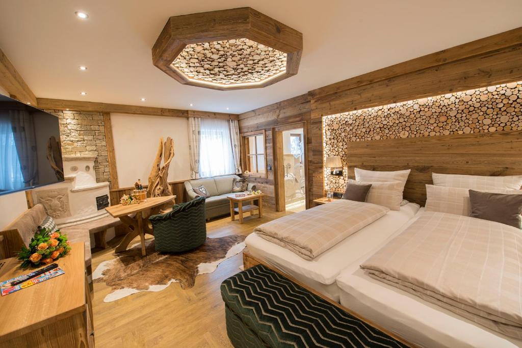 Postel nebo postele na pokoji v ubytování Wellness-Hotel ADLER