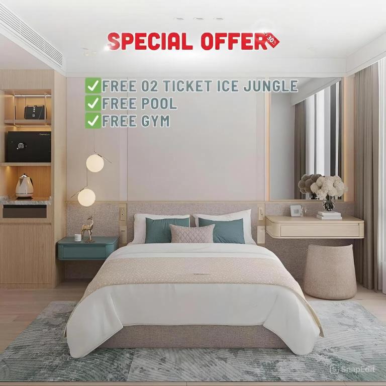 a bedroom with a large bed in a room at Mey Mansion Hotel Phu Quoc in Phu Quoc