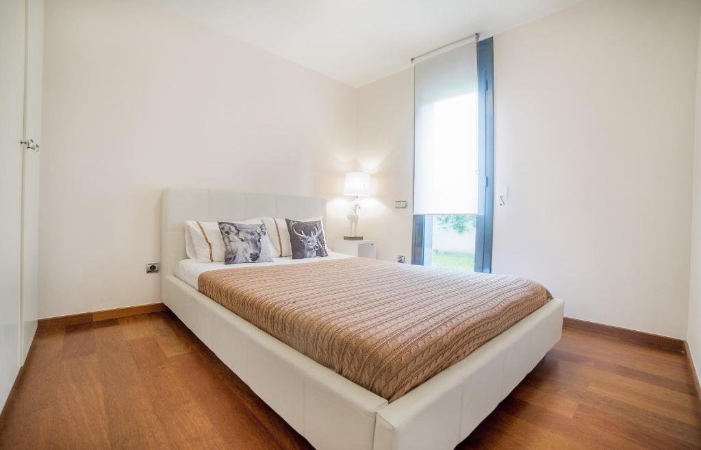 Posteľ alebo postele v izbe v ubytovaní Luxury Apartment in Sitges City
