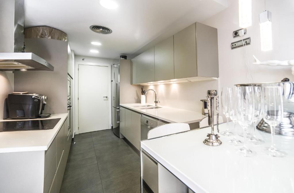 Kuchyňa alebo kuchynka v ubytovaní Luxury Apartment in Sitges City