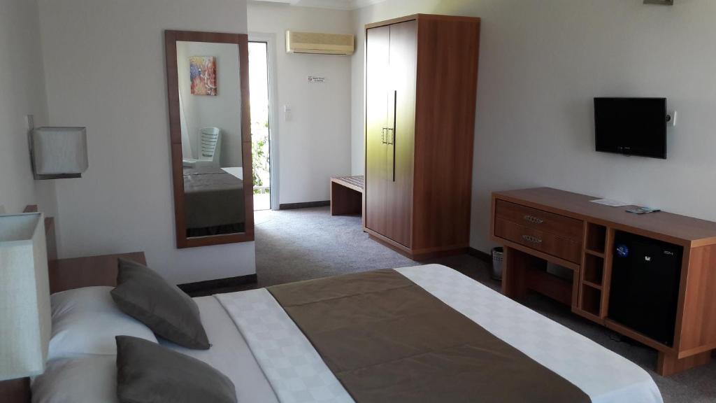 TV a/nebo společenská místnost v ubytování Melis Hotel Kusadasi