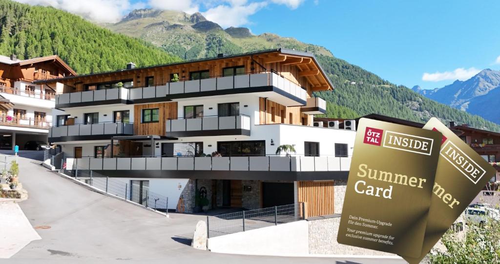 a building with a sign in front of it at Apart Natur in Sölden