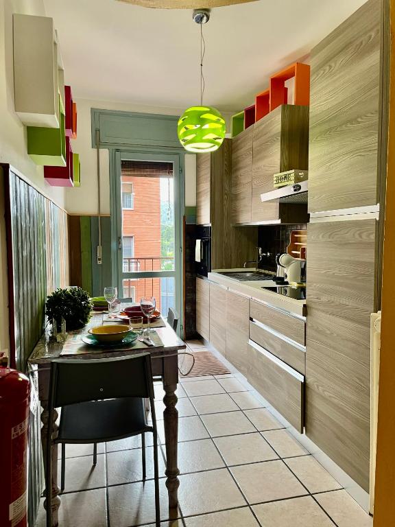 Kuchyň nebo kuchyňský kout v ubytování Bnbook - Ferrarin Apartment