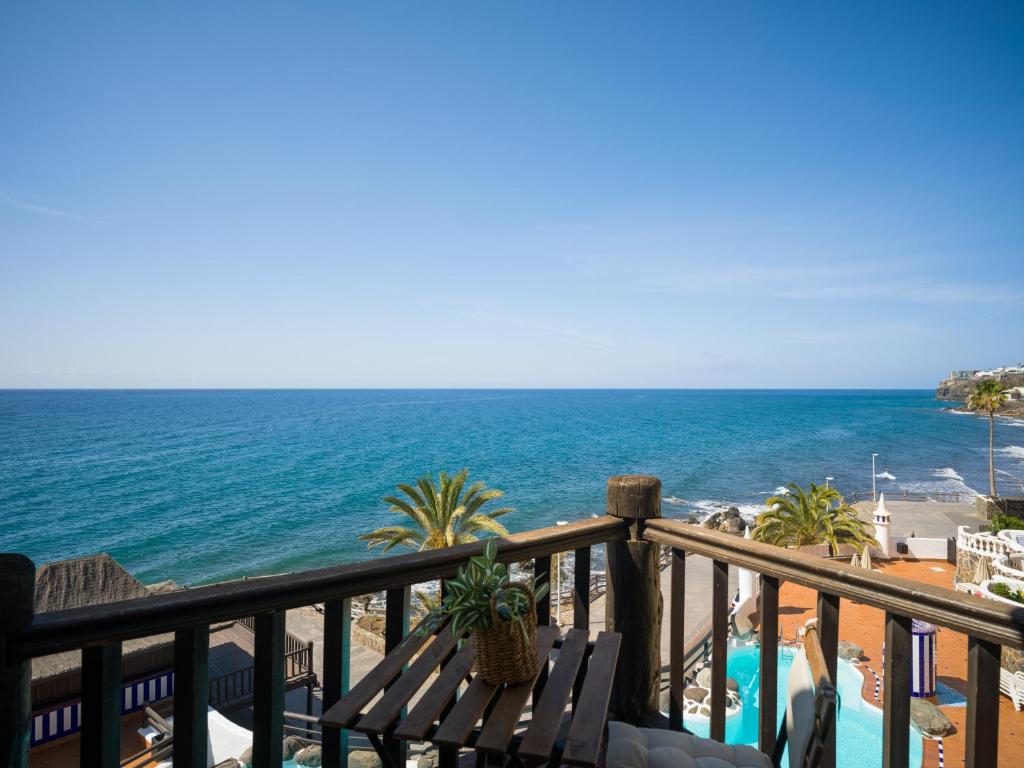 a view of the ocean from a balcony at Altamar 60 Balcony beach views By CanariasGetaway in Playa del Aguila