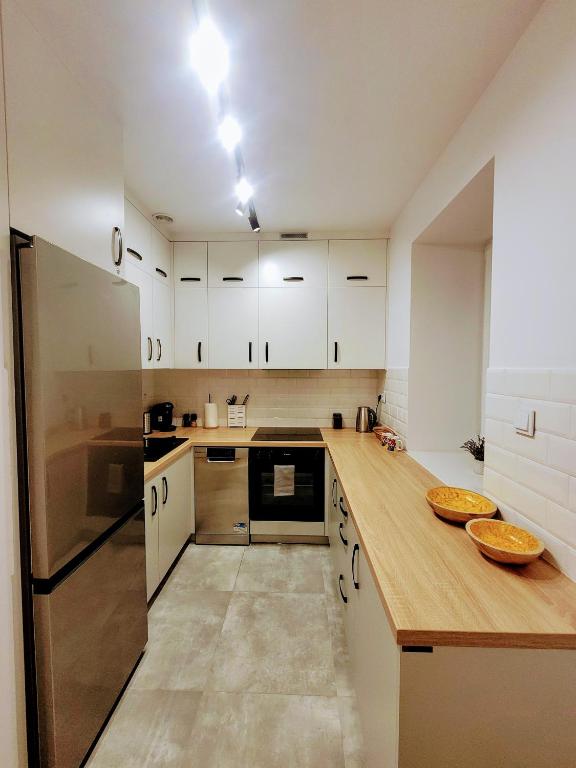 Η κουζίνα ή μικρή κουζίνα στο Apartament Hugo Boss