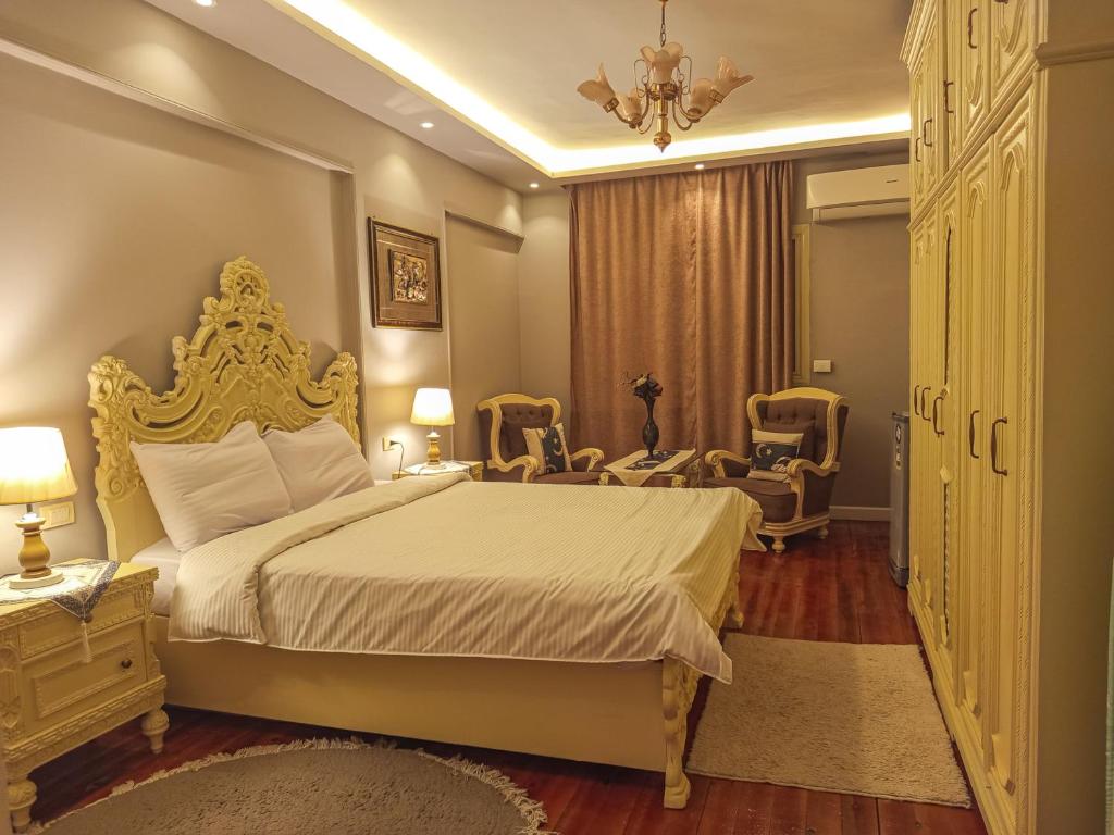 Postel nebo postele na pokoji v ubytování المهندسين شقه سوبر لوكس - محى الدين ابو العز