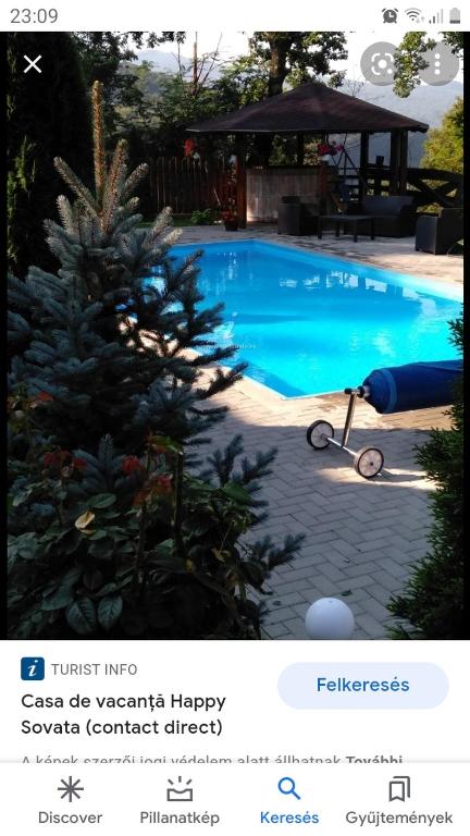 a screenshot of a picture of a swimming pool at Casa HAPPY in Sovata
