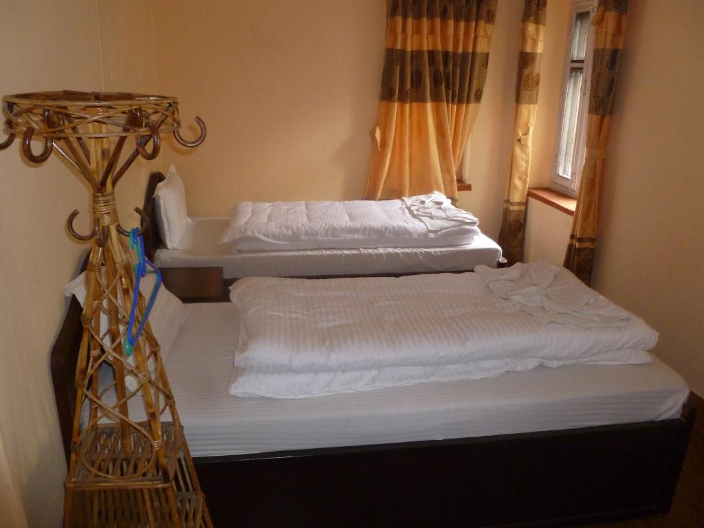 Postel nebo postele na pokoji v ubytování Andes House