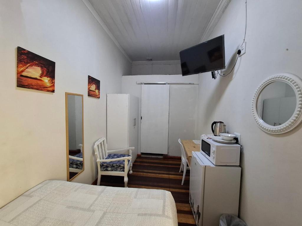 Postel nebo postele na pokoji v ubytování Rees Nest