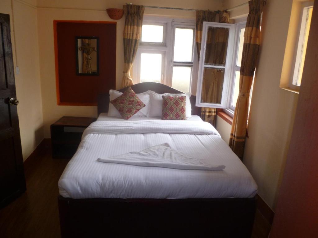 Postel nebo postele na pokoji v ubytování Andes House