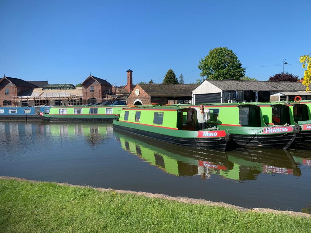 a couple of boats parked on the water at Stone - Boat - Sleeps 2 - Pet Friiendly- 85ws in Stone
