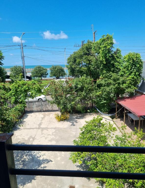 a view of a yard from a balcony at David Dali House in Batumi