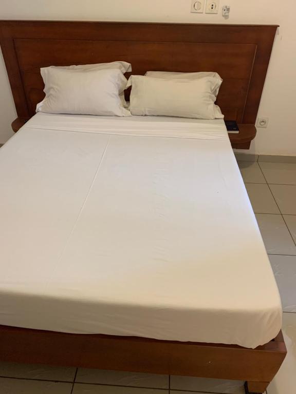 Postel nebo postele na pokoji v ubytování Bunker hôtel plus
