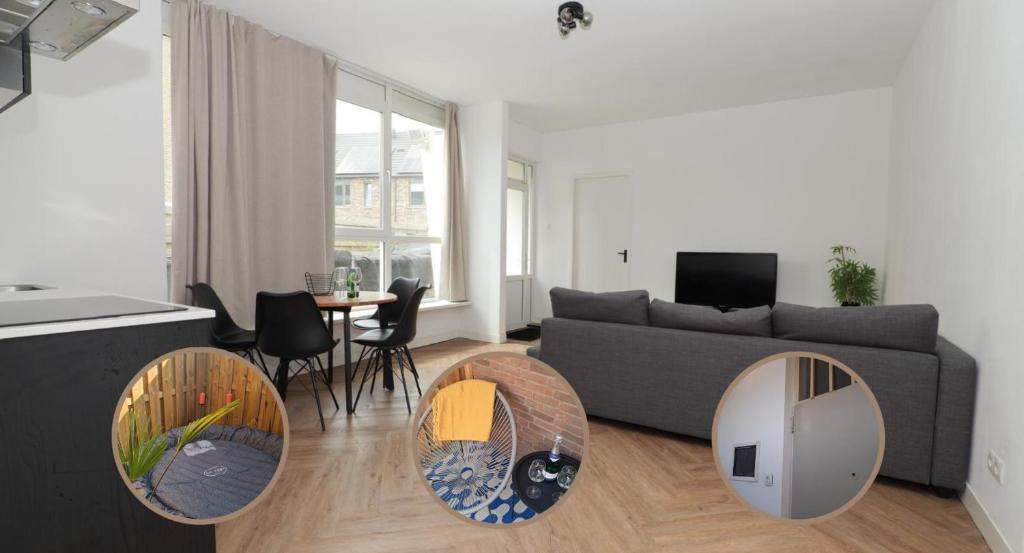 a living room with a couch and a table at Modern apartment nearby Eindhoven in Leende