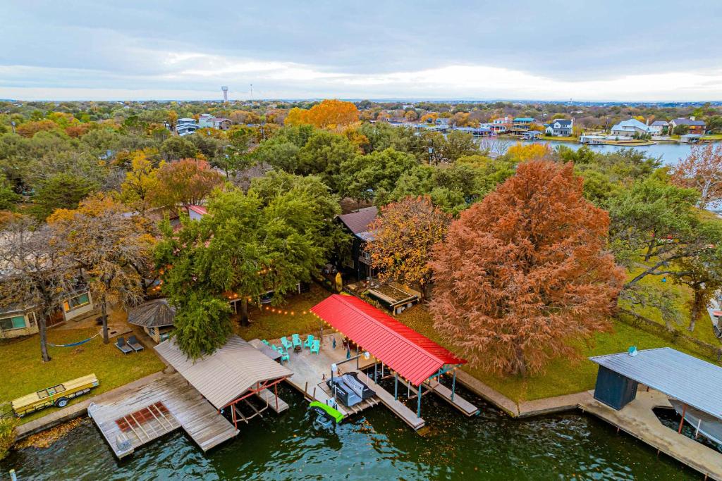 an overhead view of a house with a red roof at Lake LBJ Waterfront Family-Friendly Retreat in Granite Shoals
