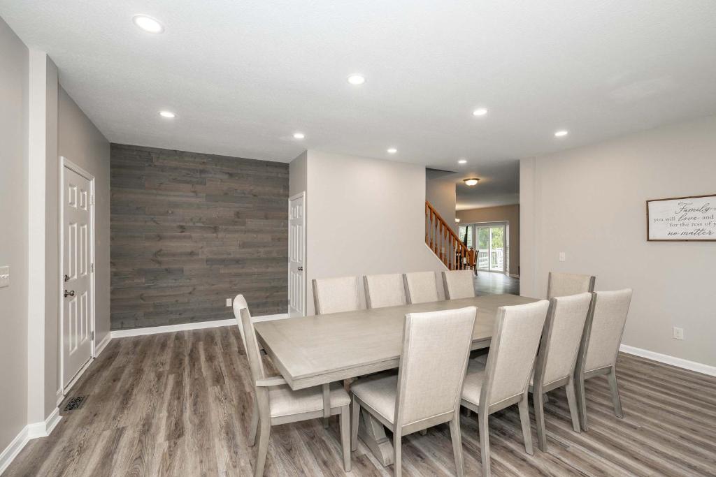 a dining room with a table and chairs at Ark & Creation Retreat - For 12 in Walton
