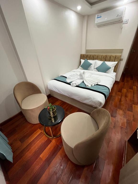Voodi või voodid majutusasutuse Hotel Yuvan toas