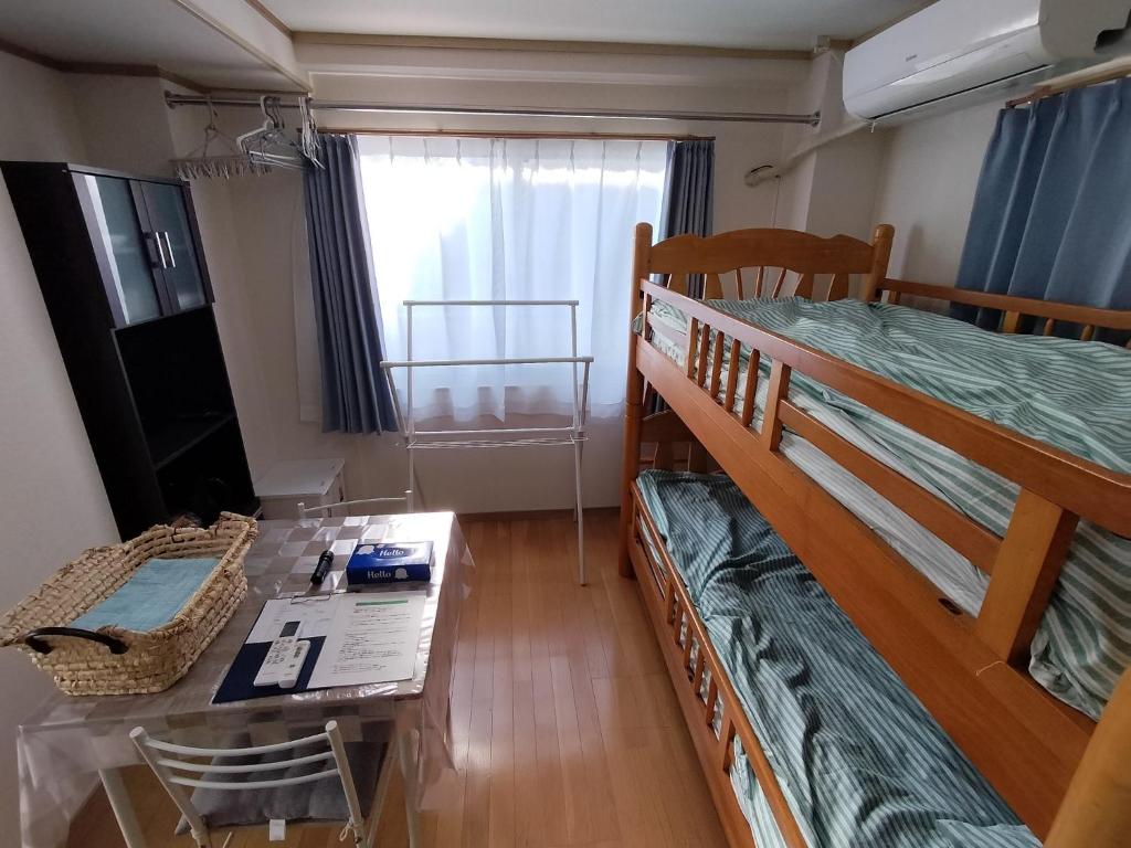 Ένα ή περισσότερα κρεβάτια σε δωμάτιο στο Marbury Heights Kotsutsu - Vacation STAY 92150v