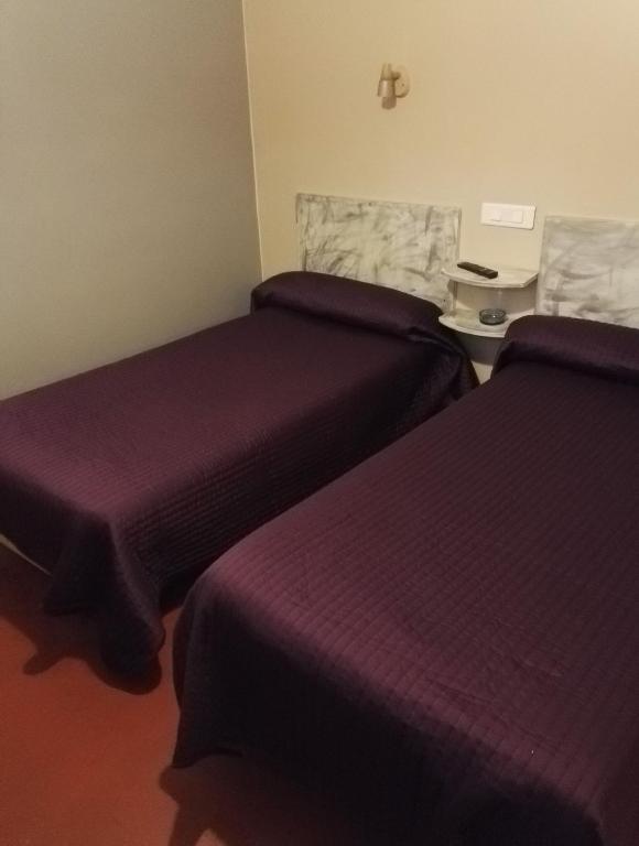 Postel nebo postele na pokoji v ubytování Le Chemin Neuf