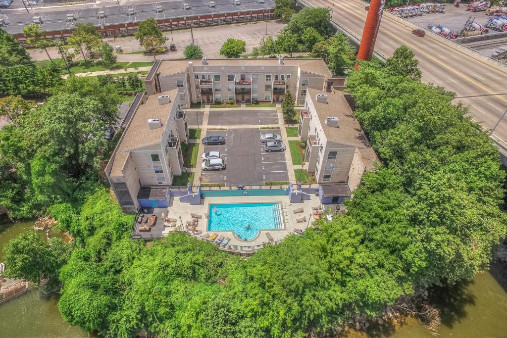 an overhead view of a mansion with a swimming pool at Riverfront Condo in DT in Nashville
